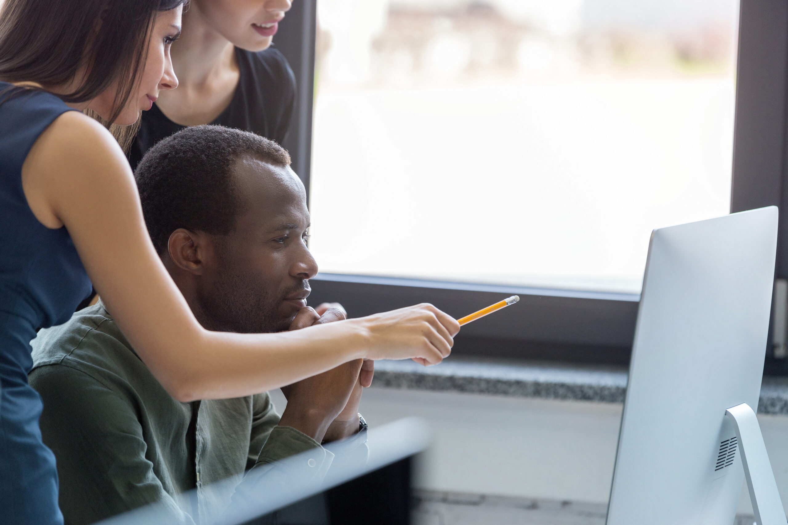 Group of happy business people in a meeting group happy business people meeting scaled